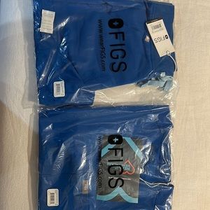 Brand new unopened figs scrubs. Royal blue. XS top and bottom